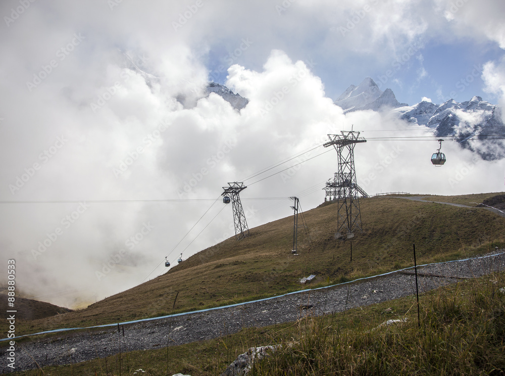 Mountain peaks and cable cars in Grindelwald, Switzerland