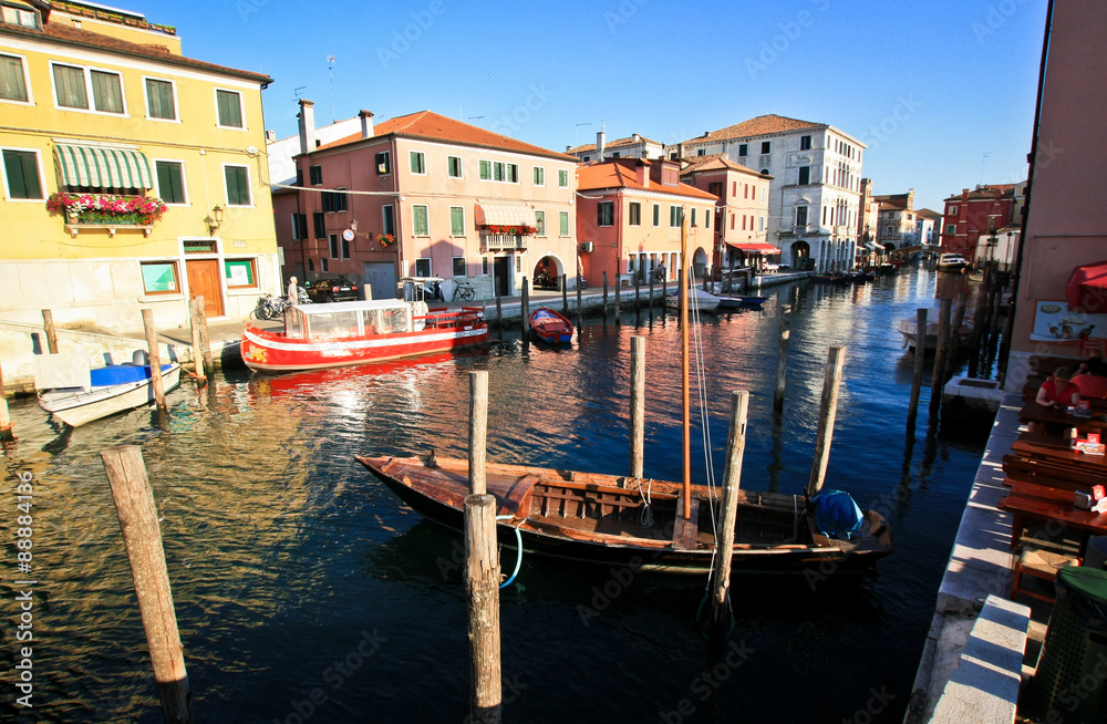Boats on a canal in the Italian town