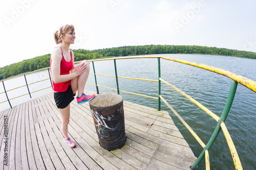 Stretching at bridge during jogging