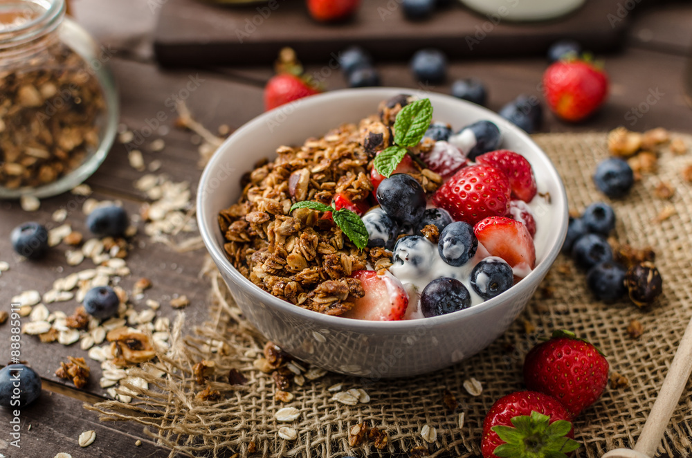 Αυτοκόλλητο Yogurt with baked granola and berries in small bowl