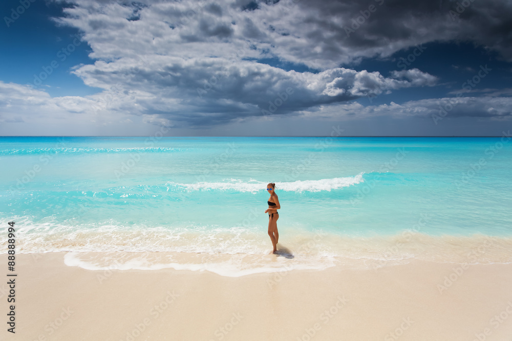 Beautiful woman on the Cancun beach