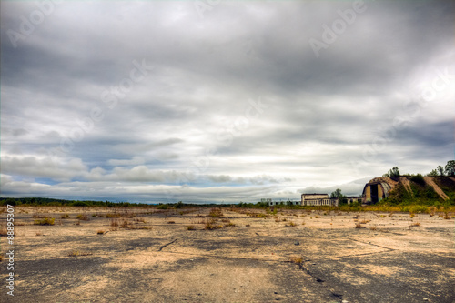 Bild auf Leinwand Abandoned military airfield. Overgrown ruins