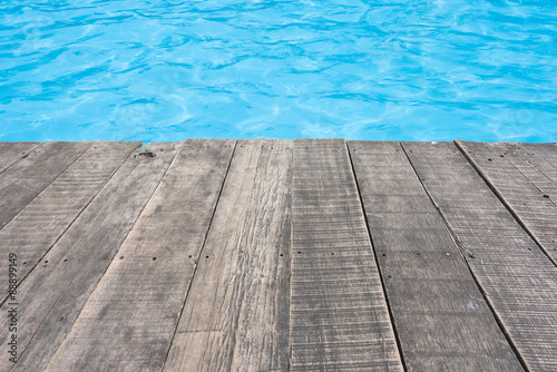 Swimming pool and wooden deck for backgrounds