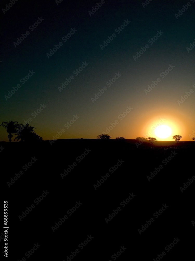 Sundown on farm landscape Sundown on farm landscape