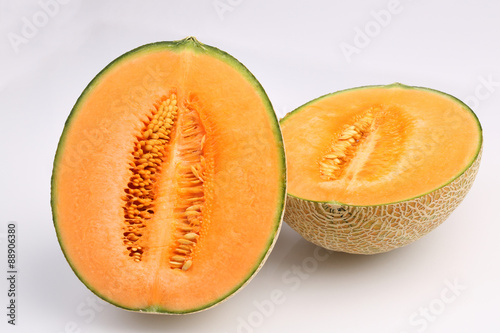 Organic Cantaloupe melon fruit isolated on white background