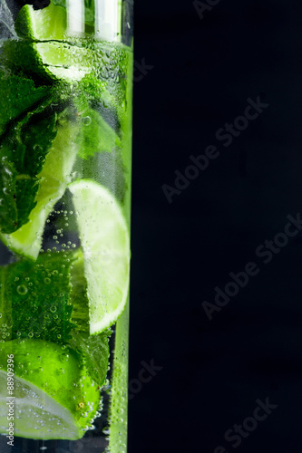 Mojito cocktail on the dark background