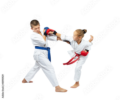 With overlays on hands boy and girl beats punches