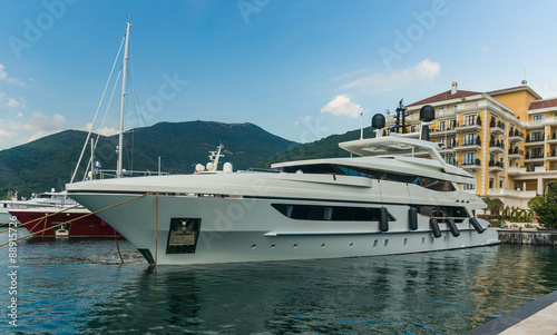 Yacht at Luxury Waterfront Mansion in Porto Montenegro © Ruslan Gilmanshin