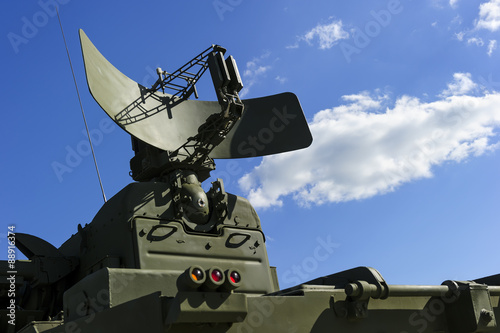 Air defense radar of military mobile mighty rocket launcher system of green colo Fototapet