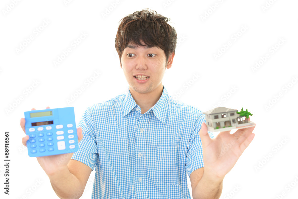 計算機を持つ男性 計算機を持つ男性