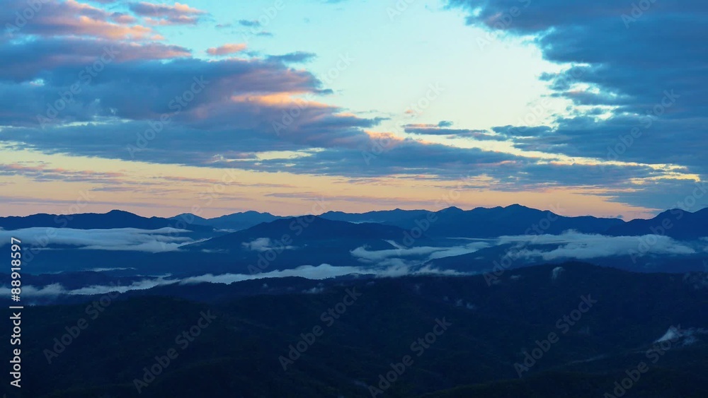Sunrise and moving cloud with mountain view at the north of thailand Sunrise and moving cloud with mountain view at the north of thailand
