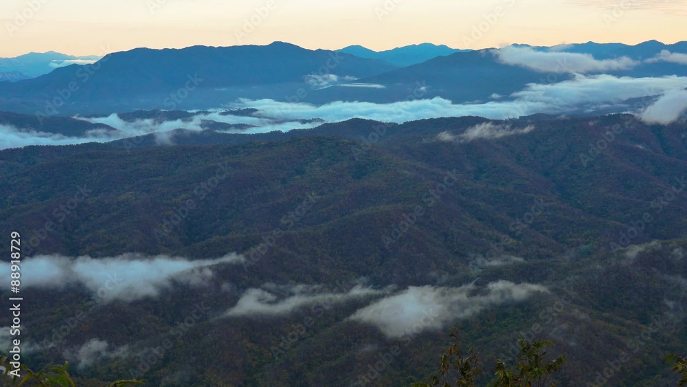Sunrise and moving cloud with mountain view at the north of thailand Sunrise and moving cloud with mountain view at the north of thailand