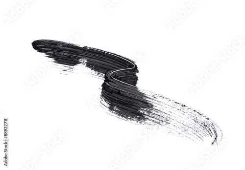 smear of black mascara isolated on white photo