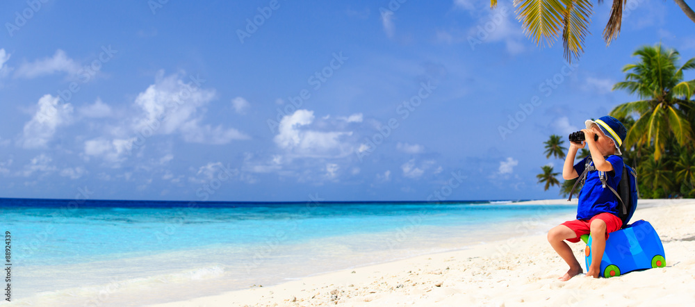 little boy travel on summer tropical beach with suitcase little boy travel on summer tropical beach with suitcase