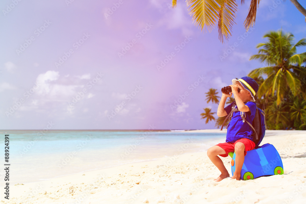 little boy travel on summer tropical beach with suitcase little boy travel on summer tropical beach with suitcase