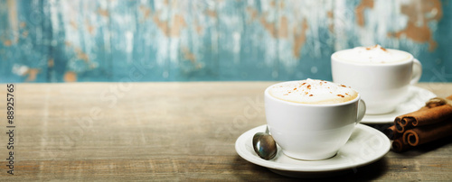 Slika na platnu Two cups of coffee on the table
