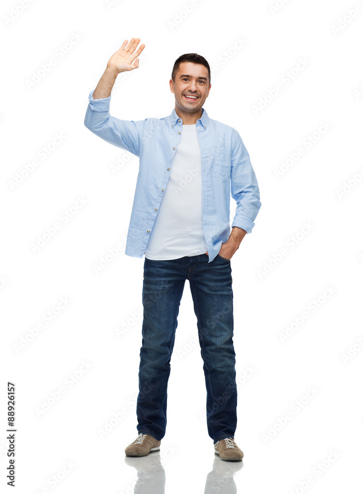 smiling man waving hand smiling man waving hand