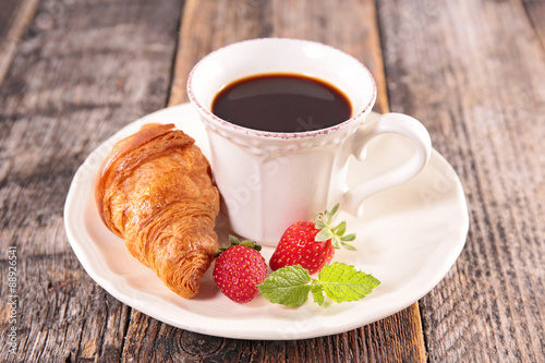 coffee cup and croissant