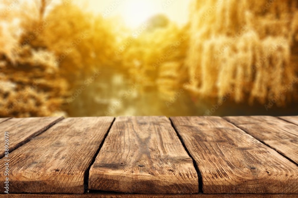 wooden table and autumn day wooden table and autumn day