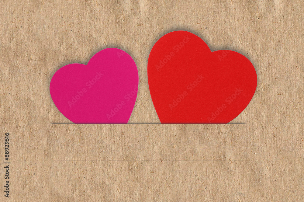 Paper hearts on brown background, close up Paper hearts on brown background, close up