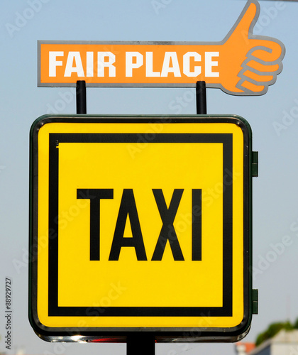 Big beautiful taxi sign at the taxi rank. A big beautiful cab sign in a cab stand. Stock photo.