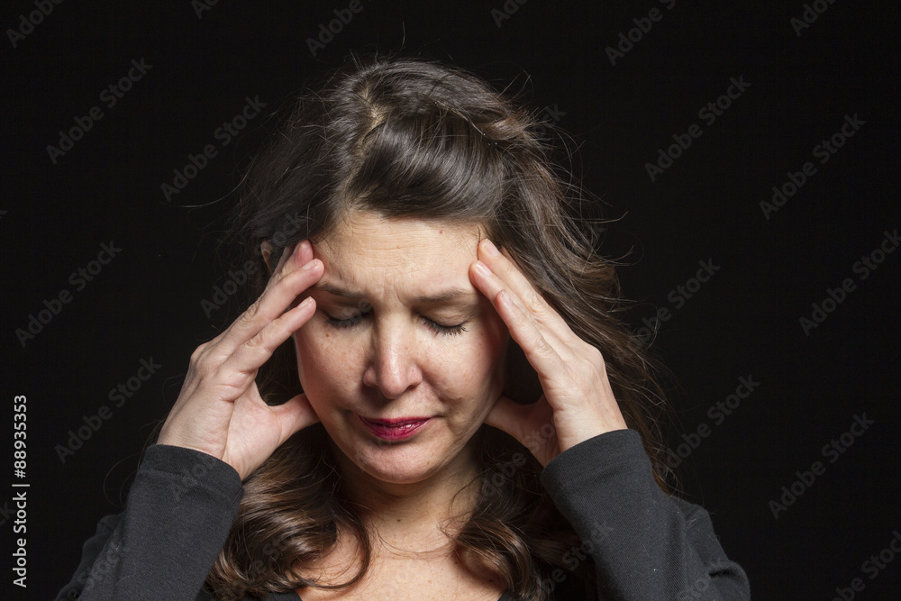 Studio portrait of a stressed Caucasian female Studio portrait of a stressed Caucasian female
