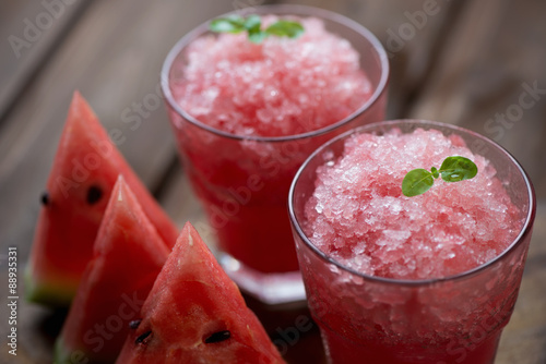 Two glasses with watermelon granita, close-up, studio shot