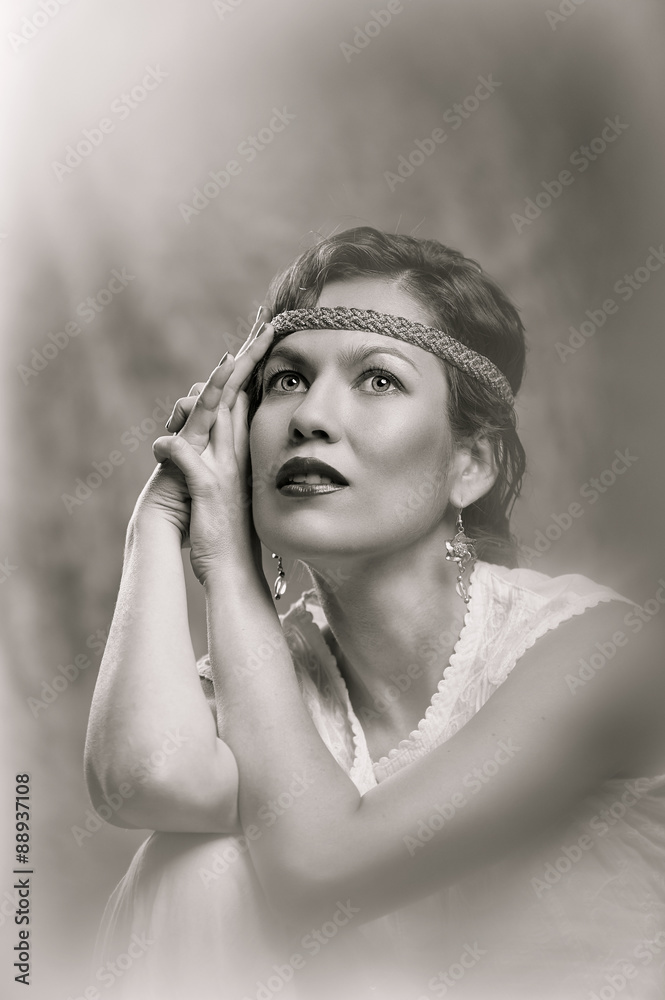 Obraz premium Young girl posing studio black-and-white portrait vintage style