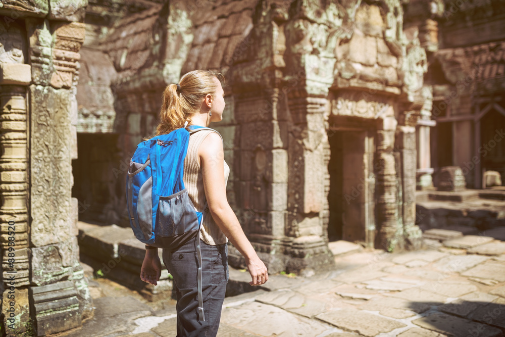 Female tourist and the Preah Khan temple in Angkor, Cambodia