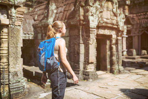 Female tourist and the Preah Khan temple in Angkor, Cambodia © efired