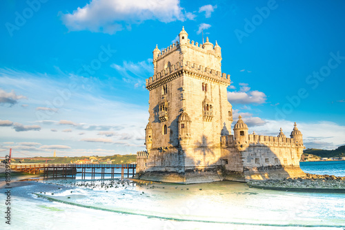 Belem Tower on the Tagus river in the morning, famous city landm photo