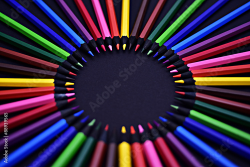 Set of Realistic Colorful Colored Pencils on the black background 