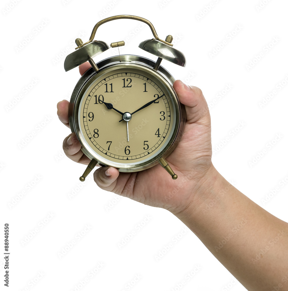 Hand holding a clock on white background Hand holding a clock on white background