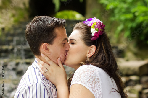 Young couple kissing in the nature