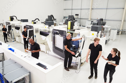 High Angle View Of Engineering Workshop With CNC Machines