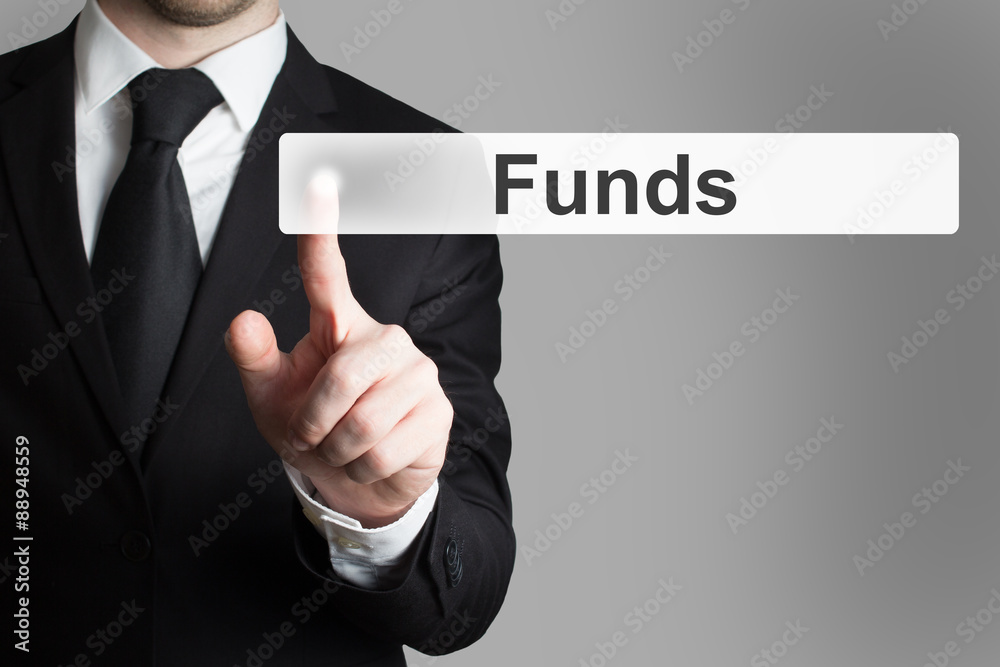businessman pushing touchscreen button funds businessman pushing touchscreen button funds