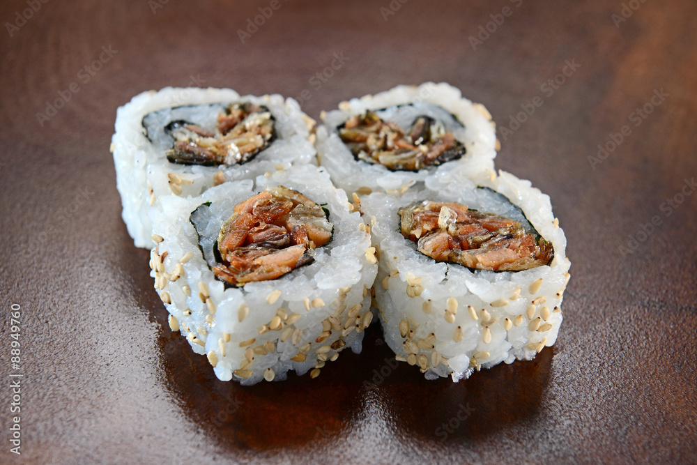 Sushis on wooden background