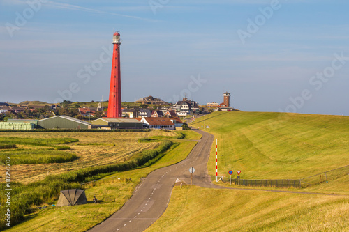 Lighthouse at the coast of Den Helder in Northern Holland photo