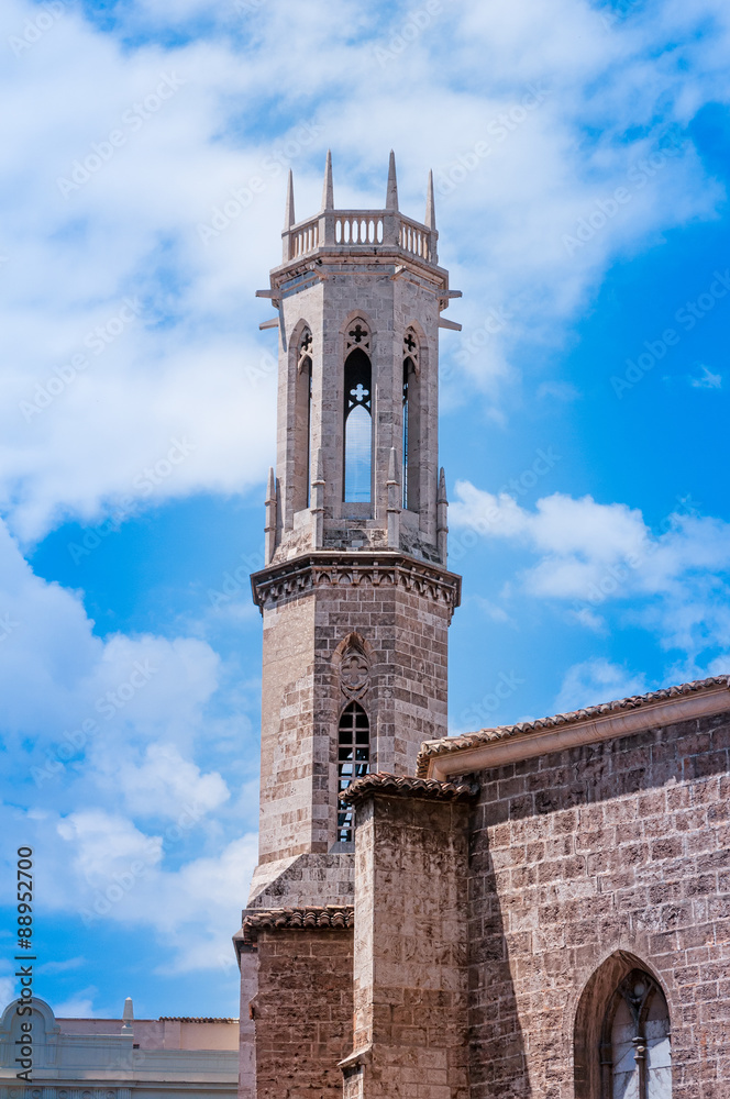 Antique tower on blue sky background