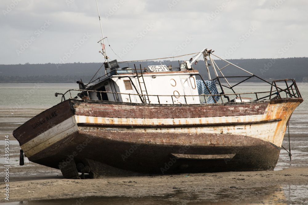 Old boat on the beach in low tide in Inhambane, Mozambique
Old boat on the beach in low tide in Inhambane, Mozambique