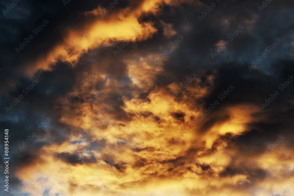 dramatic blue sky  with red and black clouds