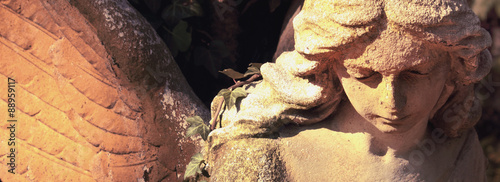 Fotografie Vintage image of a sad angel on a cemetery