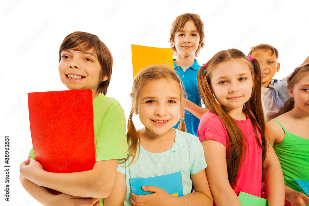 Learning is fun large group of kids with books Learning is fun large group of kids with books