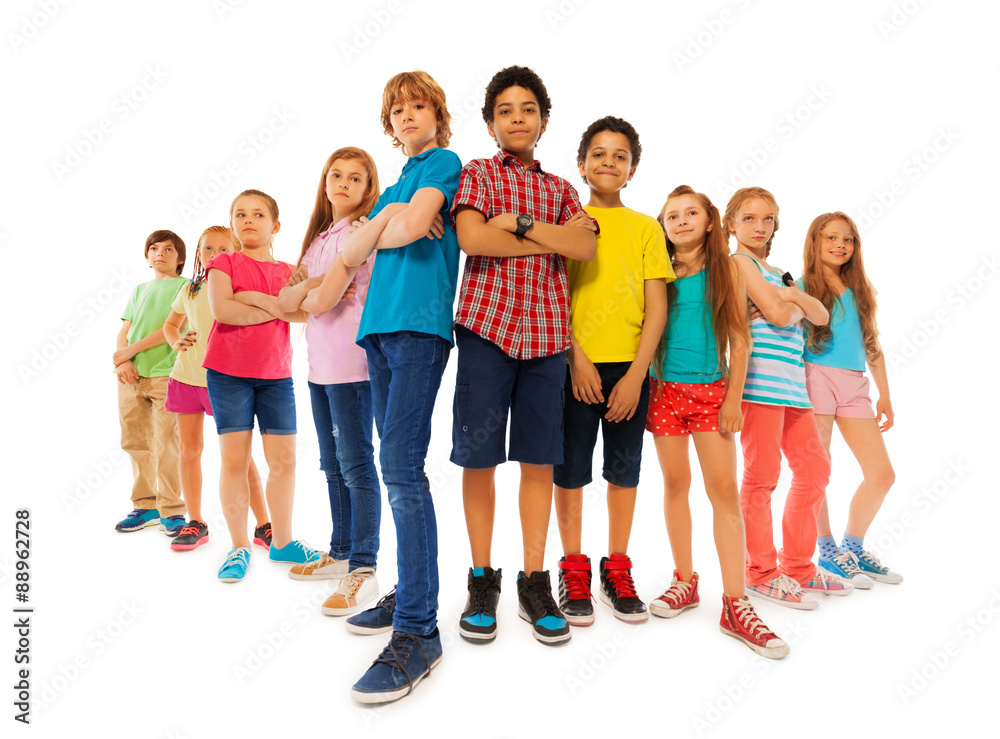 Many confident boys and girls stand together Many confident boys and girls stand together