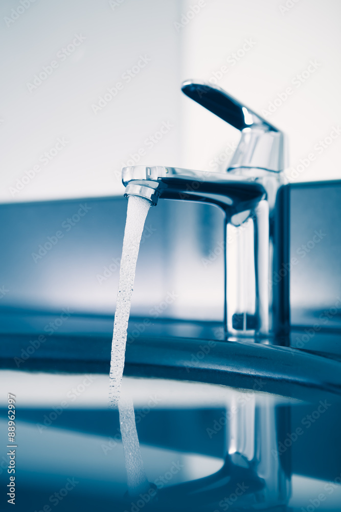 faucet with flowing water, blue tone faucet with flowing water, blue tone