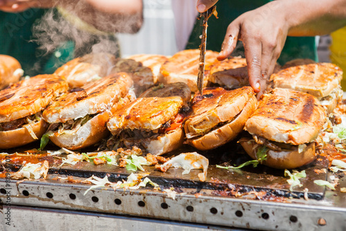  close up of street food sandwich shucos from Ecuador