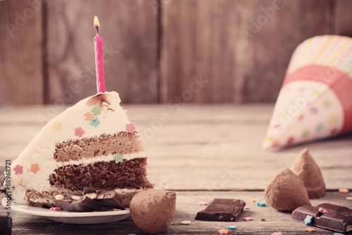 Birthday cake on wooden background