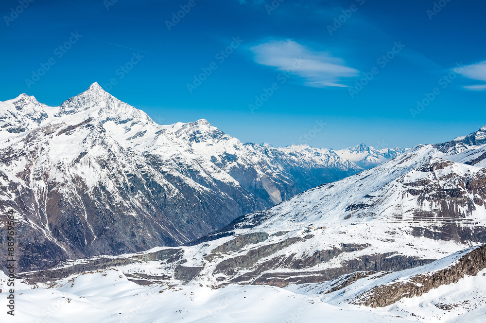 High mountains under snow in the winter High mountains under snow in the winter