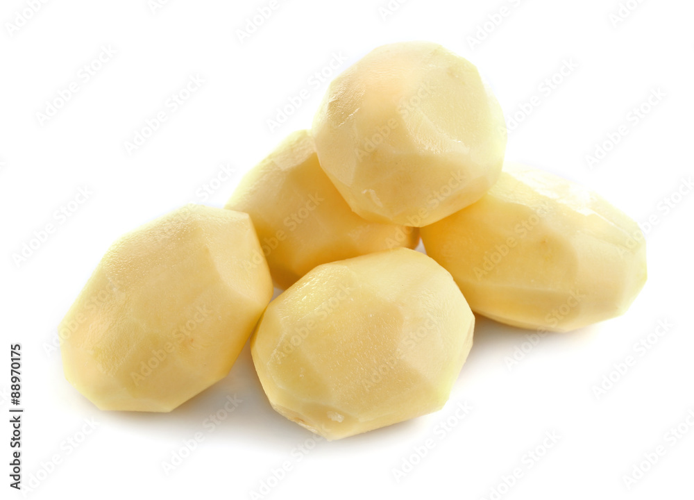 Raw peeled potatoes isolated on white