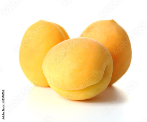 Ripe apricots isolated on white